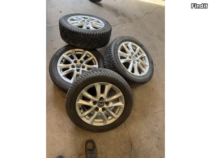 Säljes Mazda fälgar med bra vinterdäck
