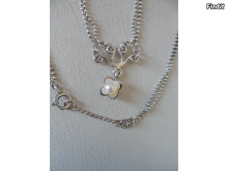 Säljes Kalevala Lumpeenkukkia kaulakoru Hopea