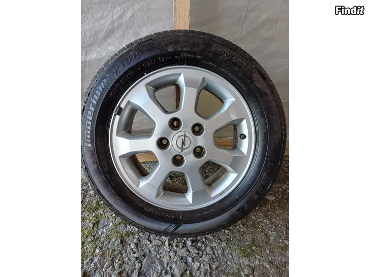 Myydään Astra lähes uudenveroiset kesärenkaat