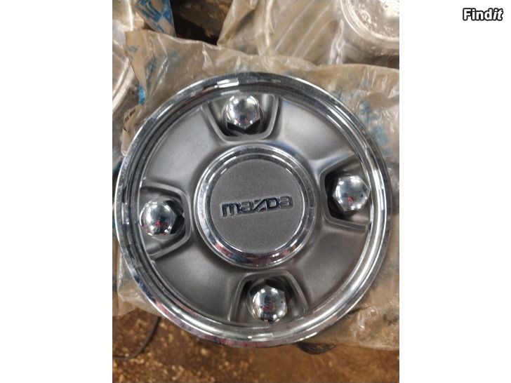 Säljes Mazda 323 navkapslar