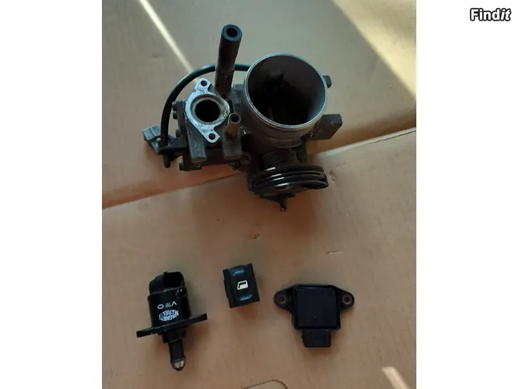 Myydään Kaasuläpäkotelo tyhjäkäyntimoottori lasinnostimen kytkin kaasuläpän asentotunnistin