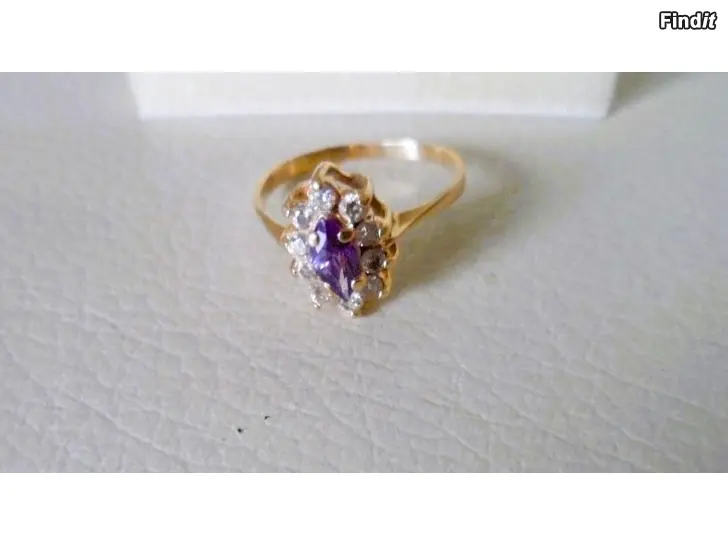 Myydään Sormus lila kivi Kulta 14K koko n.18