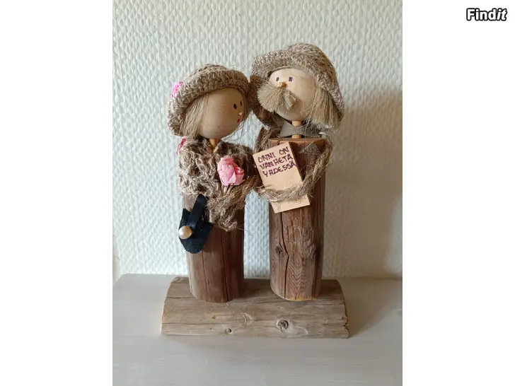 Säljes Puinen Vanha pari koriste