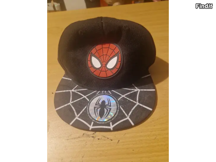 Säljes Svart Spiderman keps med spindelnät