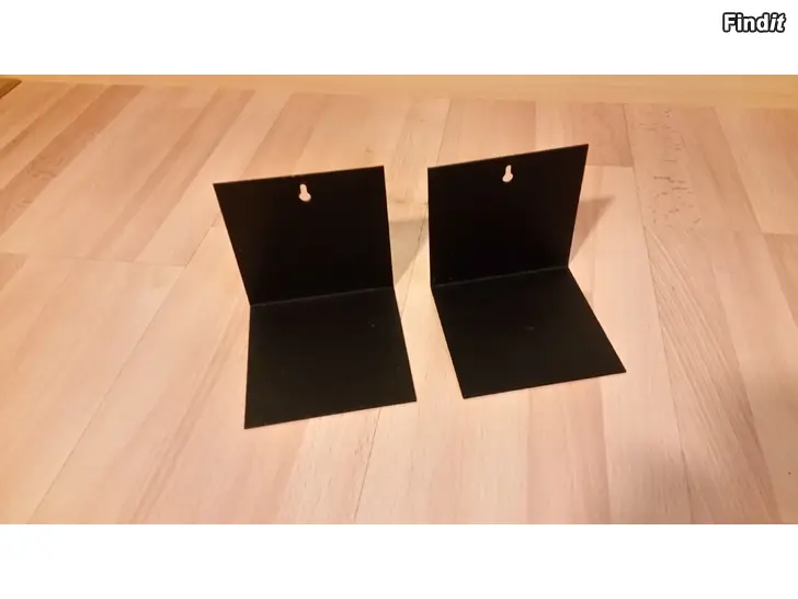 Myydään 2kpl kirjatuki hyllylle  musta metalli  -4e
