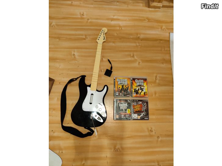 Myydään PS3 Rock Band gitarr+dongle samt fyra Guitar Hero spel