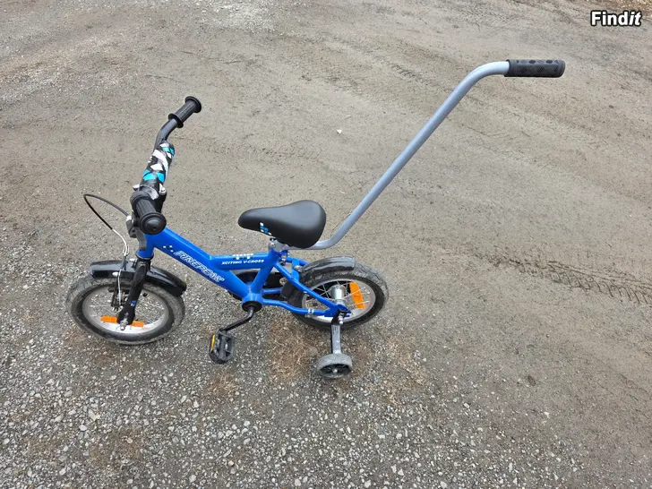 Säljes Pinepeak cykel 12 tums med stödhjul