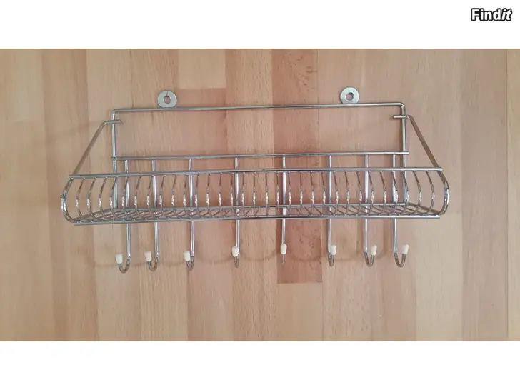 Myydään Pieni hylly metallia - 8 koukkua leveys 32cm  -hinta 6e