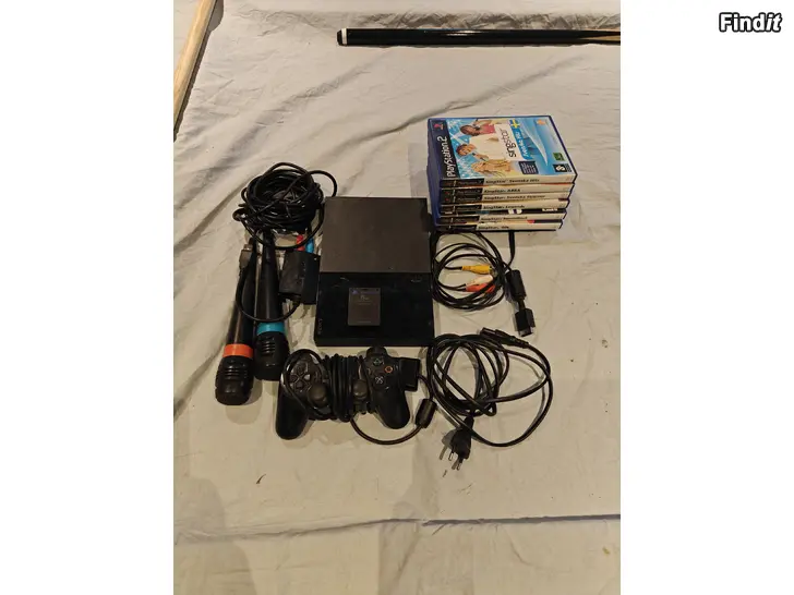 Myydään Ps 2 + 8Mb minne + Singstar mikrofoner + 6 singstar skivor