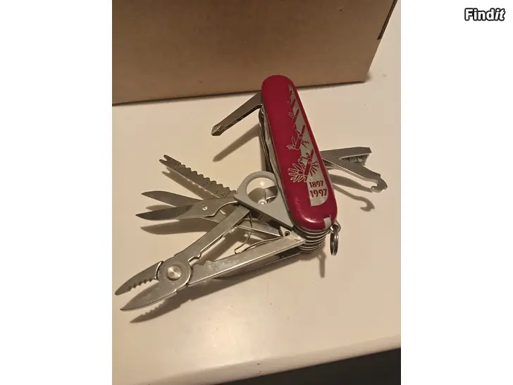 Säljes Victorinox SwissChampin upseerinveitsen 100-vuotisjuhlapainos 1.6794.J97 numero 29542