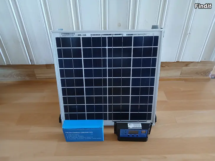 Myydään Aurinkopaneeli 10W, alumiiniteline, lataussäädin 10A