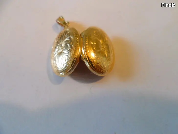 Myydään 14K kultainen medaljonki 23mm