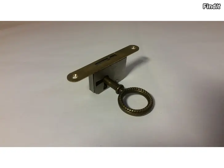 Myydään Asko kirjahyllyn alakaapin oven lukko ja avain 5e
